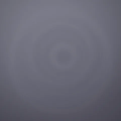 Abstract mark: a disc setting behind a level horizon